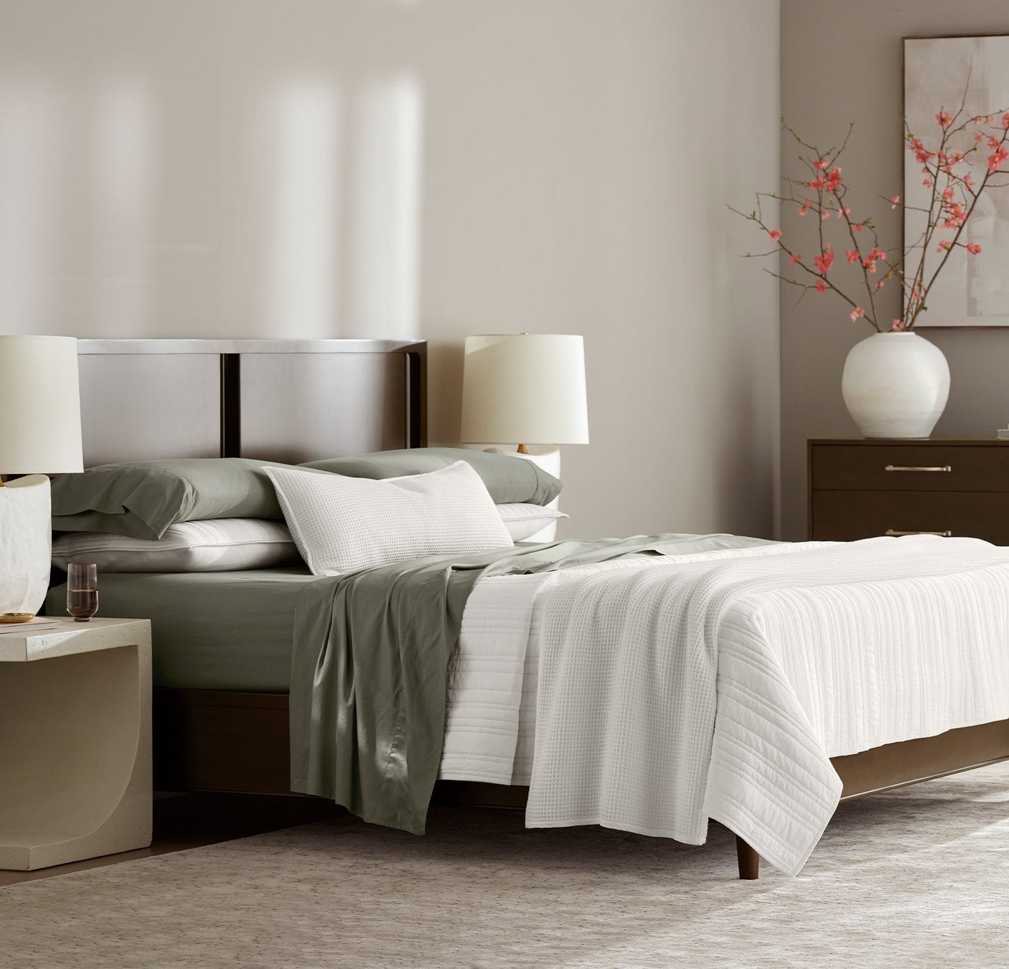 Lifestyle image of bed made with Sheet Set in Juniper