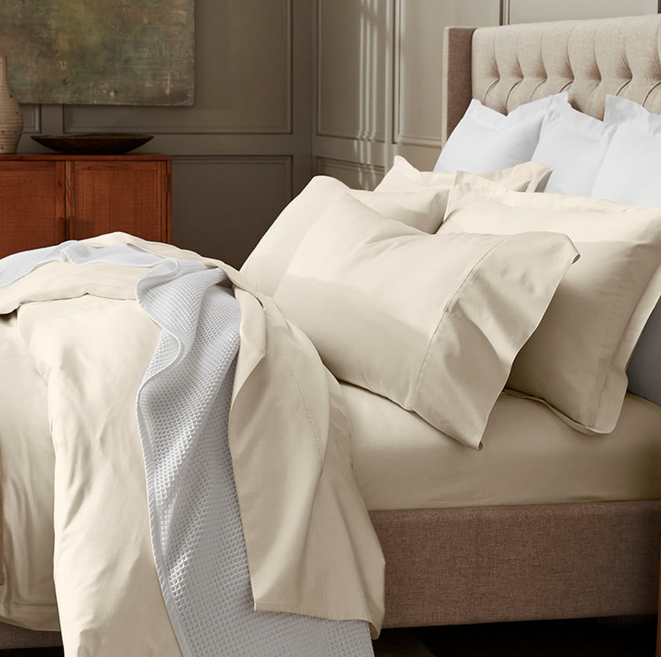 Lifestyle image of bed made with Hemmed Duvet Set in Natural