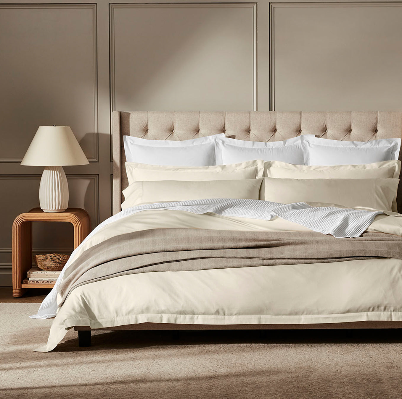 Lifestyle image of bed made with Hemmed Duvet Set in Natural