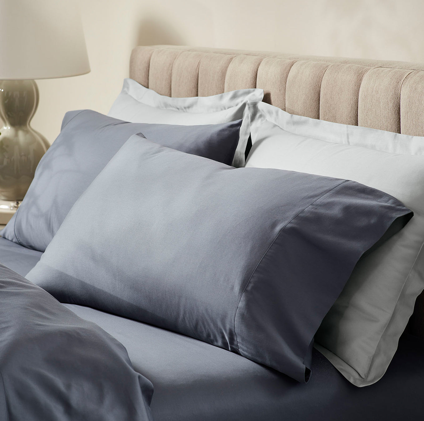 Detail image of bed made with Sheet Set in Mineral