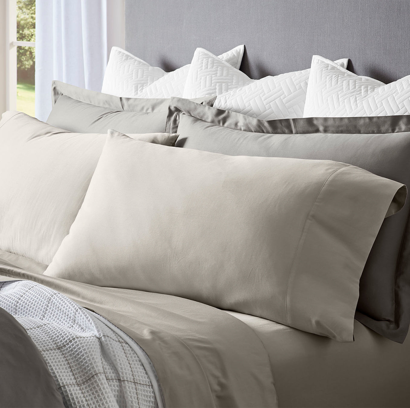 Detail image of bed made with Sheet Set in Pewter