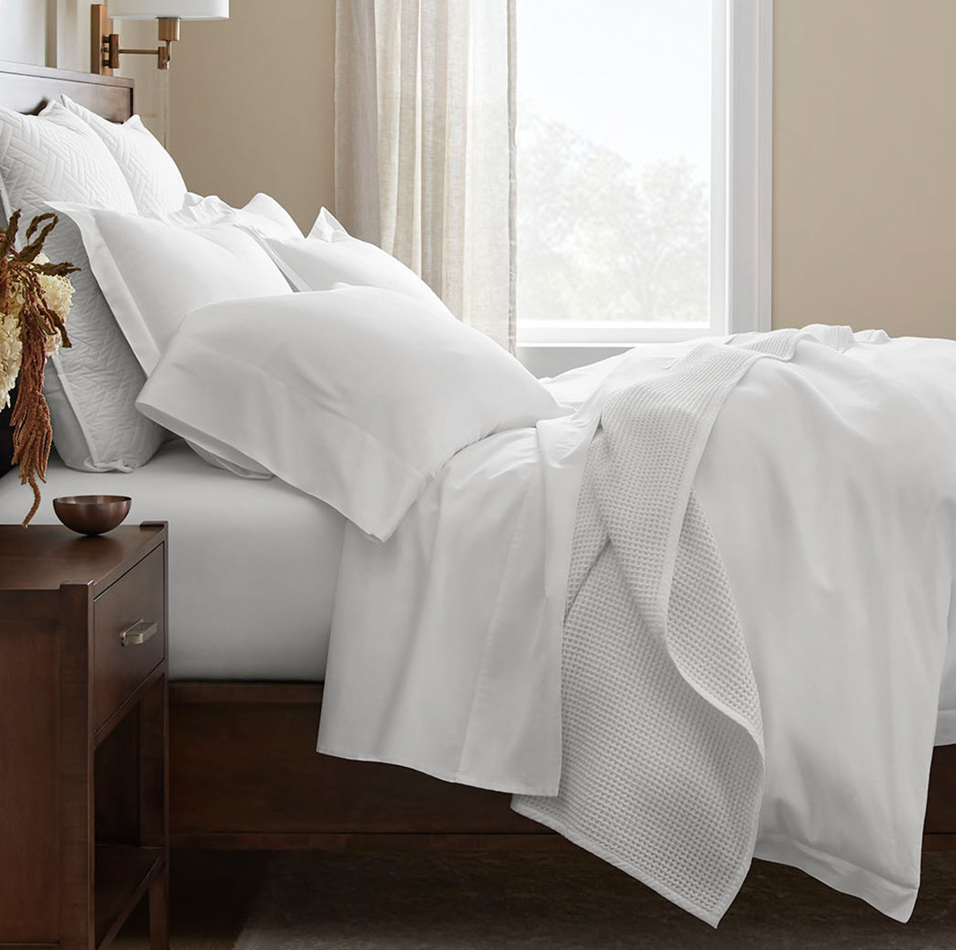Bed made with Signature Hemmed Sheet Set in White