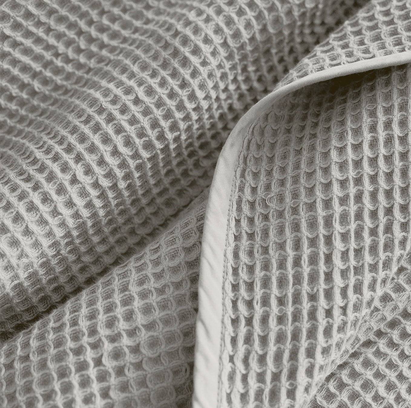 Detail image of bed made with Waffle Bed Blanket in Pewter
